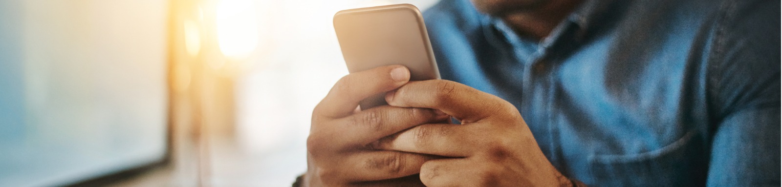 Young businessman using a mobile phone