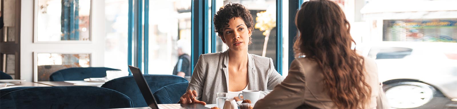 Women having a cafe meeting