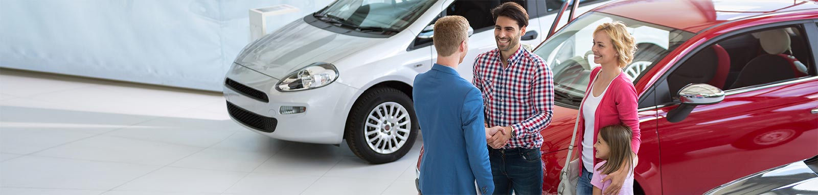 Familiy buying a car from car dealer