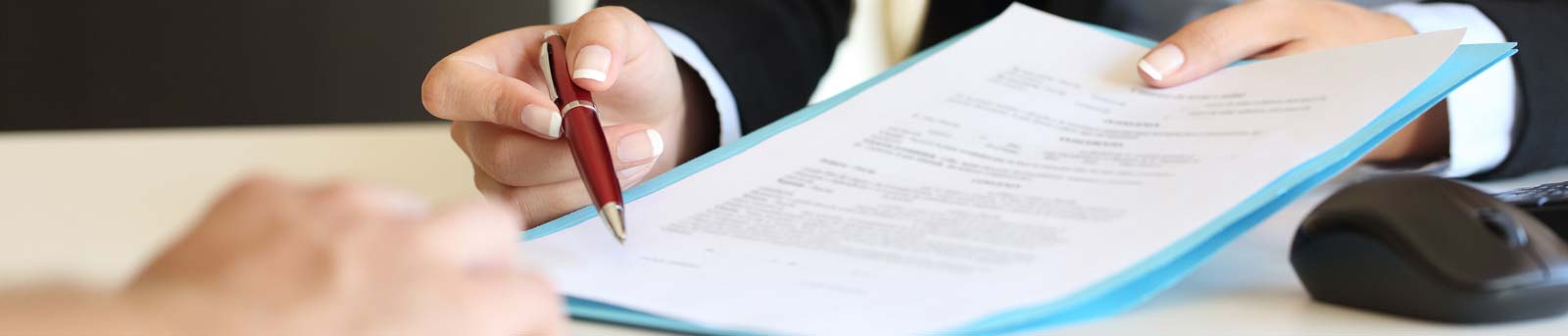 Man holding documents for a loan approval