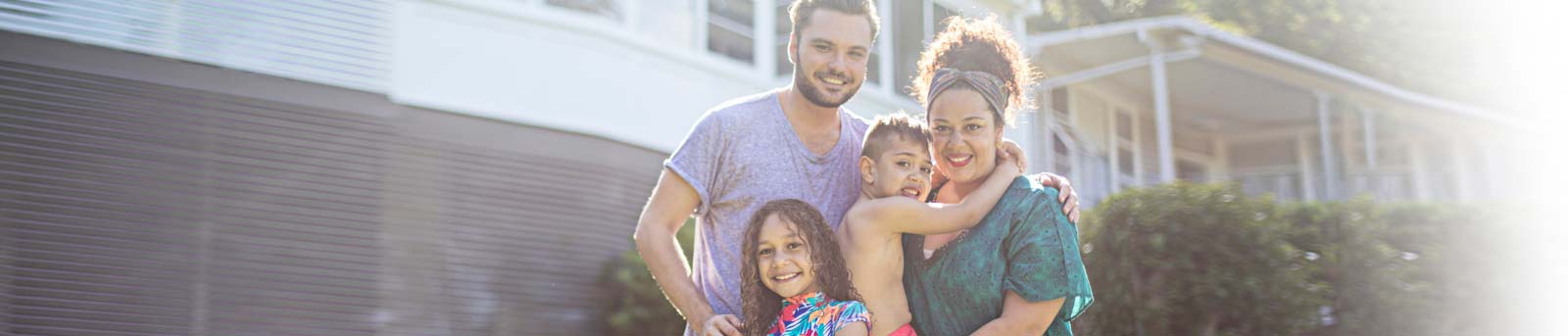 Family outside their home