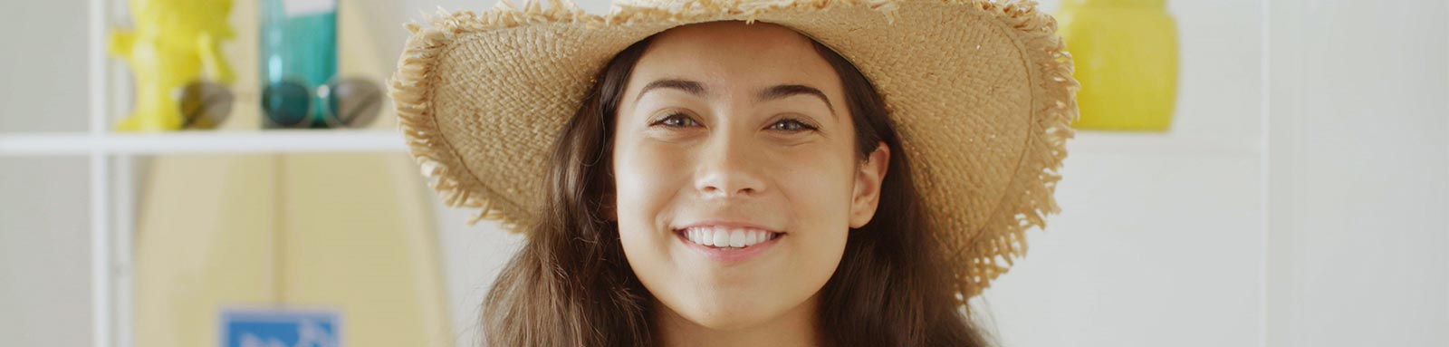 Girl wearing a straw hat