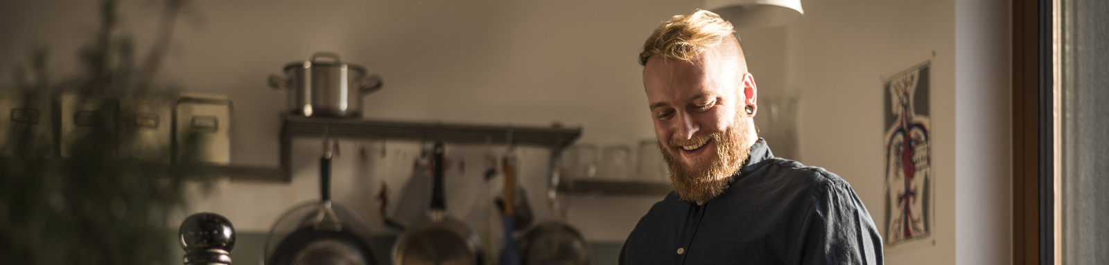 Bearded man in kitchen