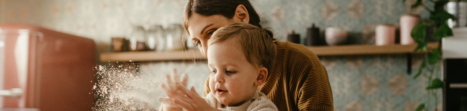 Child in kitchen with mum