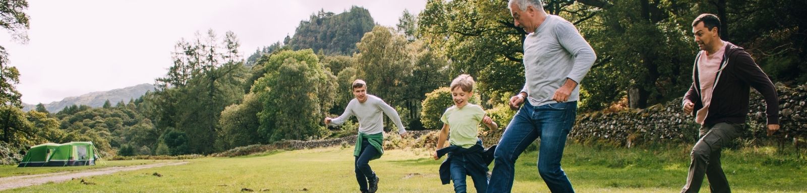 Family playing soccer