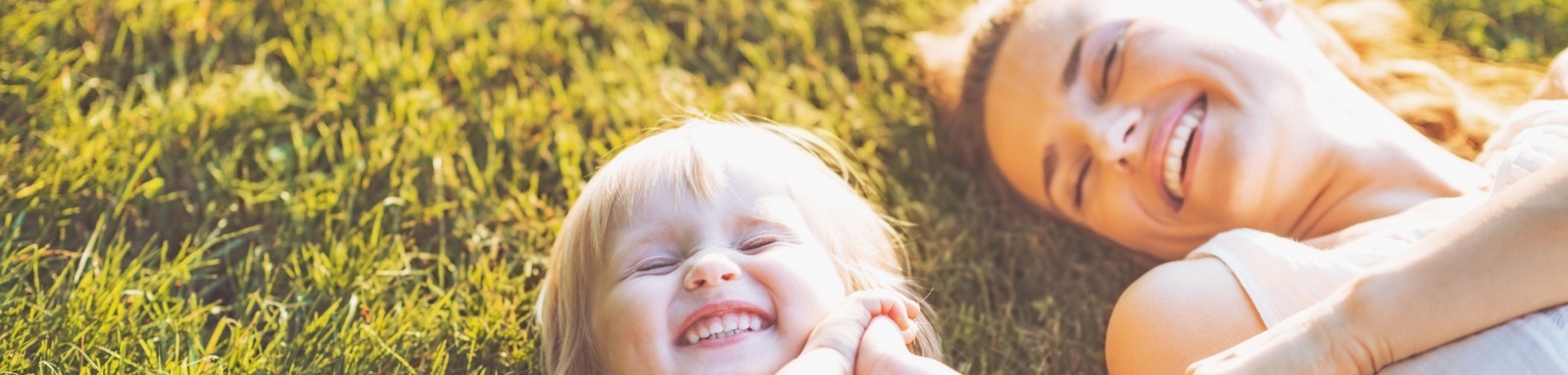 Mother and daughter on the grass