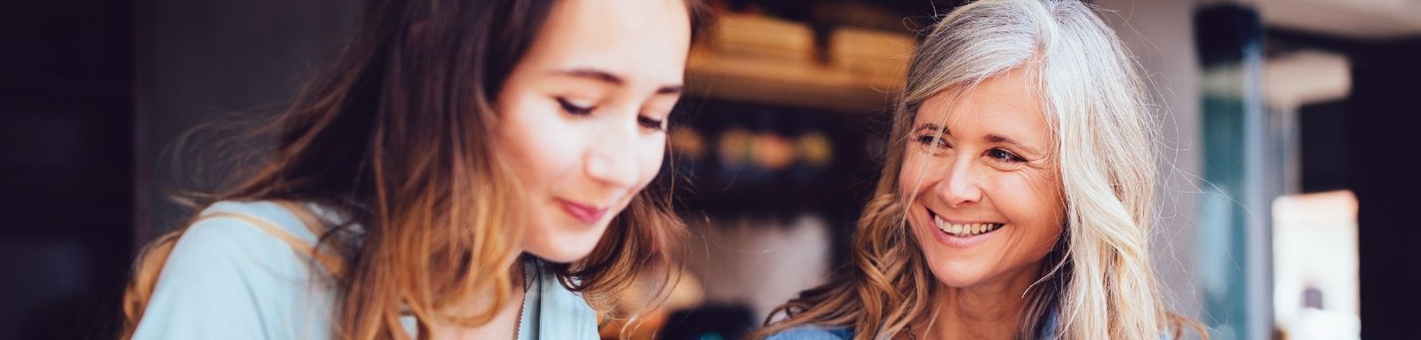 Mother and daughter at a cafe