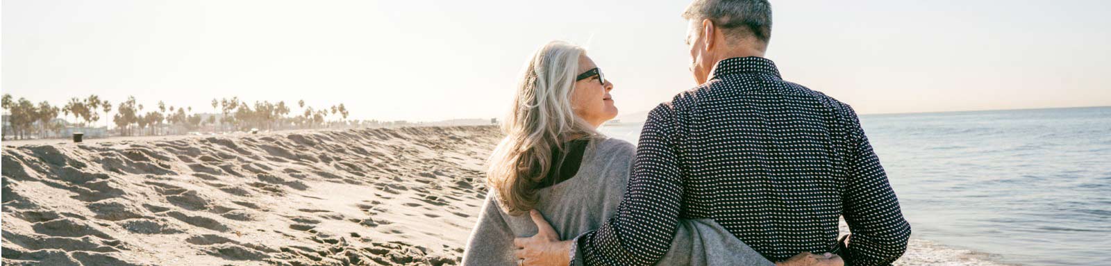 Old couple on the beach