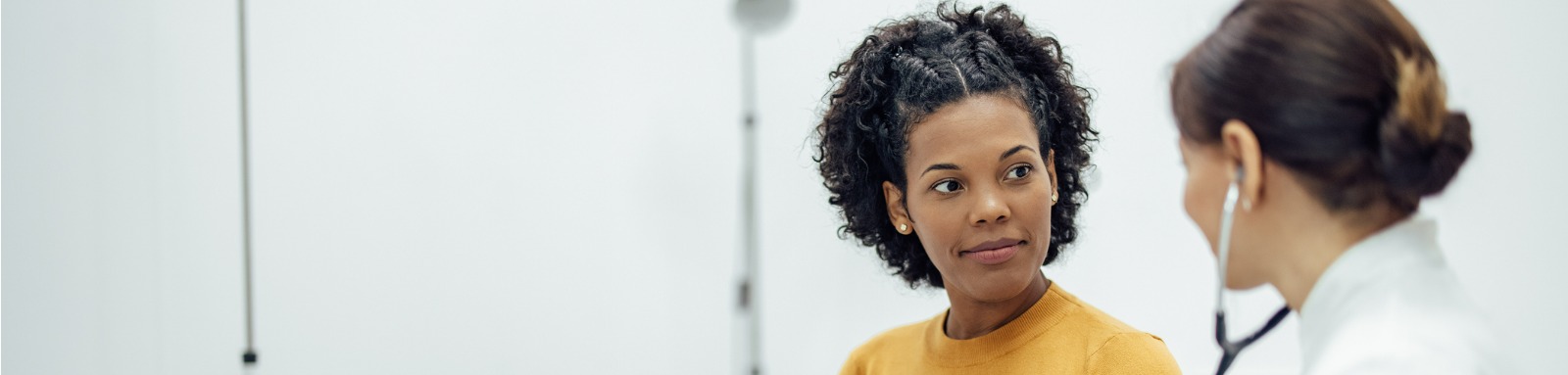 Woman talking to a doctor