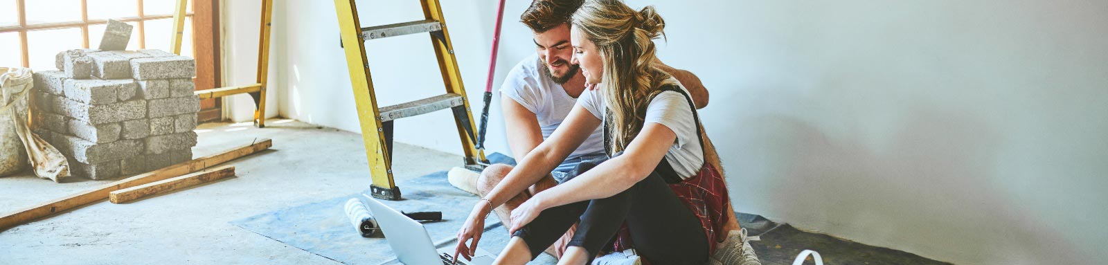 Couple renovating a house