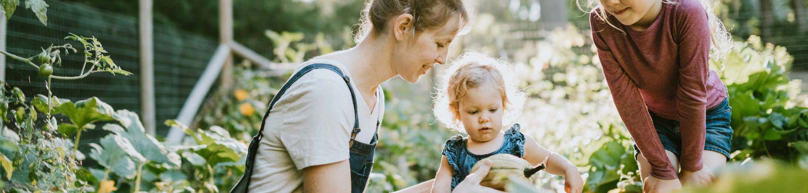 Parent and children gardening