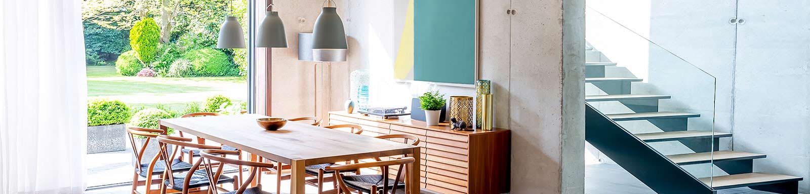 Green pendant lights in dining room