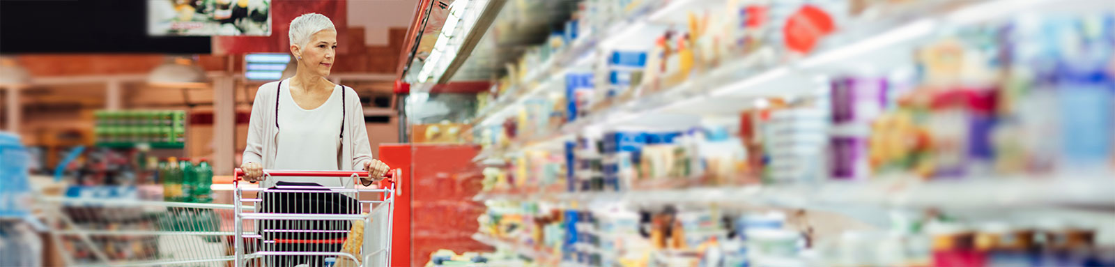 Elderly woman shopping for grocery