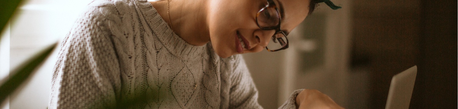 Young woman working at laptop