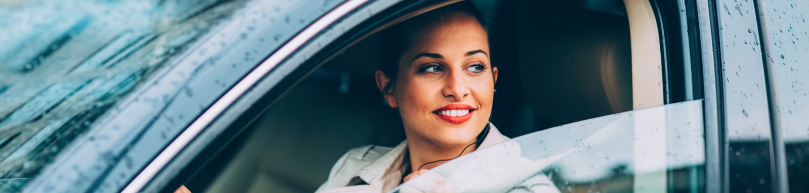 rainy-day-woman-in-drivers-seat-look-out-window