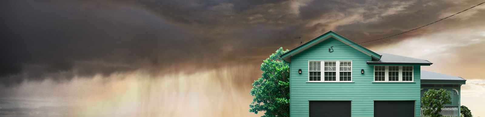 House with a rainy sky background