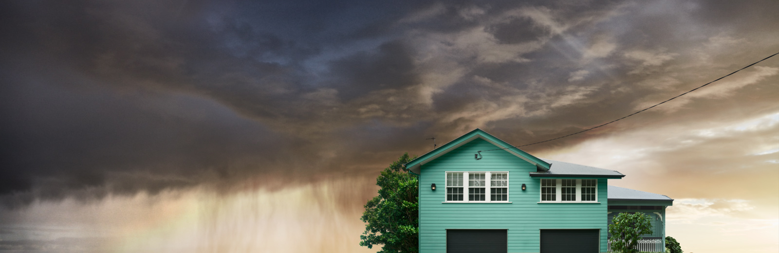 House with a rainy sky background