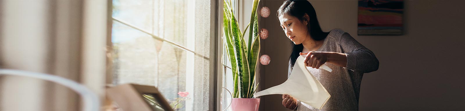 Woman watering plants