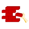 Hand placing brick